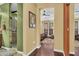 Bright hallway with view into bedroom and bathroom at 2458 E Roma Ave, Phoenix, AZ 85016