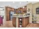 Modern kitchen with stainless steel appliances and wood cabinets at 2458 E Roma Ave, Phoenix, AZ 85016