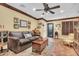 Spacious living room featuring hardwood floors and comfortable seating at 2458 E Roma Ave, Phoenix, AZ 85016