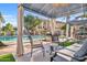 Relaxing poolside cabana with seating and shade at 2458 E Roma Ave, Phoenix, AZ 85016