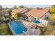 Aerial view of the backyard featuring a swimming pool, lounge chairs and a covered patio area at 3457 E Ellis St, Mesa, AZ 85213