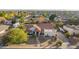 Single story home with terracotta tile roof, landscaped yard, and driveway at 3457 E Ellis St, Mesa, AZ 85213