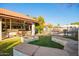 Beautiful backyard view showcases the patio, and pool, offering a private and relaxing outdoor space at 3457 E Ellis St, Mesa, AZ 85213