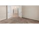 Bedroom with carpeting, open double doors, and neutral walls at 3457 E Ellis St, Mesa, AZ 85213