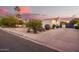 View of the driveway on a one story home with desert landscaping at 3457 E Ellis St, Mesa, AZ 85213
