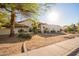 Charming single-Gathering home features a tile roof, stucco exterior, and meticulously maintained landscaping at 3457 E Ellis St, Mesa, AZ 85213