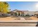 Charming single-Gathering home features a tile roof, stucco exterior, and meticulously maintained landscaping at 3457 E Ellis St, Mesa, AZ 85213