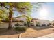 Charming single-Gathering home features a tile roof, stucco exterior, and meticulously maintained landscaping at 3457 E Ellis St, Mesa, AZ 85213