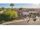 A well-maintained single-Gathering home displays its Southwestern architecture and desert-friendly landscape at 3457 E Ellis St, Mesa, AZ 85213