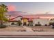 Charming single-story home featuring desert landscaping and a red tile roof at 3457 E Ellis St, Mesa, AZ 85213