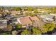 Exterior featuring a covered patio, swimming pool, surrounded by mature landscaping, and a neighborhood street at 3457 E Ellis St, Mesa, AZ 85213