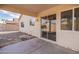 Covered patio with sliding glass door access to the home at 3555 S Moccasin Trl, Gilbert, AZ 85297