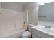 Updated bathroom with tub and a white vanity at 3555 S Moccasin Trl, Gilbert, AZ 85297