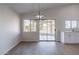 Bright dining area with sliding glass doors leading to the backyard at 3555 S Moccasin Trl, Gilbert, AZ 85297