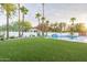 Landscaped backyard with putting green and pool at 4639 E Mountain View Ct, Phoenix, AZ 85028