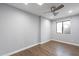 Spacious bedroom with wood floors and ceiling fan at 4639 E Mountain View Ct, Phoenix, AZ 85028