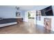 Bright bedroom with hardwood floors and access to another room at 4639 E Mountain View Ct, Phoenix, AZ 85028