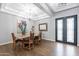 Elegant dining room with hardwood floors and a granite table at 4639 E Mountain View Ct, Phoenix, AZ 85028