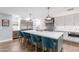 Modern kitchen with stainless steel appliances and large island with seating at 4639 E Mountain View Ct, Phoenix, AZ 85028