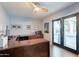 Home office features built-in desk and French doors at 4639 E Mountain View Ct, Phoenix, AZ 85028