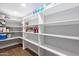 Bright and spacious pantry with ample shelving at 4639 E Mountain View Ct, Phoenix, AZ 85028