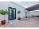 Backyard patio with pergola, potted plants, and double doors at 4639 E Mountain View Ct, Phoenix, AZ 85028