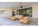 Covered patio with comfortable seating and access to interior at 4639 E Mountain View Ct, Phoenix, AZ 85028