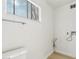 Small laundry room with hookups and light flooring at 5428 E El Sendero Dr, Cave Creek, AZ 85331