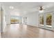 Living room with light wood floors and access to a patio at 5428 E El Sendero Dr, Cave Creek, AZ 85331