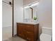 Stylish bathroom with a modern vanity and a frameless mirror at 5825 E Cochise Rd, Paradise Valley, AZ 85253