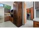 Sleek kitchen featuring modern appliances and dark wood cabinetry at 5825 E Cochise Rd, Paradise Valley, AZ 85253