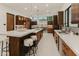 Modern kitchen with stainless steel appliances and wood cabinets at 5825 E Cochise Rd, Paradise Valley, AZ 85253
