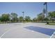 Two outdoor basketball courts with clear markings at 5951 W Irma Ln, Glendale, AZ 85308