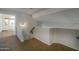Hallway with neutral walls, carpeted floor, and an arched doorway leading to other rooms at 5951 W Irma Ln, Glendale, AZ 85308