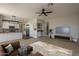 Open-concept layout seamlessly blends kitchen and living areas, creating an inviting space at 5951 W Irma Ln, Glendale, AZ 85308