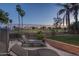 Relaxing backyard patio with comfortable lounge chairs, a private area for leisure at 5951 W Irma Ln, Glendale, AZ 85308