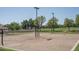 Sand volleyball court with surrounding fencing at 5951 W Irma Ln, Glendale, AZ 85308