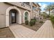 Inviting exterior with a walkway leading to the entrance of the home at 6565 E Thomas Rd # 1005, Scottsdale, AZ 85251