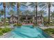 Inviting community pool with surrounding lounge chairs at 6565 E Thomas Rd # 1005, Scottsdale, AZ 85251