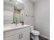 This bathroom includes modern vanity and tiled shower at 6990 E 6Th St # 1005, Scottsdale, AZ 85251