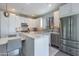 Well-equipped kitchen with stainless steel appliances and modern cabinetry at 6990 E 6Th St # 1005, Scottsdale, AZ 85251