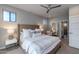 Serene main bedroom with a plush bed and ample natural light at 6990 E 6Th St # 1005, Scottsdale, AZ 85251