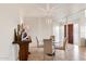 Small dining area with glass table and four chairs at 7928 E Glenrosa Ave # 5, Scottsdale, AZ 85251