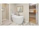 Spa-like bathroom with freestanding tub and walk-in closet at 7956 E Via Costa --, Scottsdale, AZ 85258