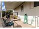 Covered patio with seating and a garden view at 9333 E University Dr # 55, Mesa, AZ 85207
