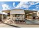 Mobile home features a carport and well-maintained yard at 9333 E University Dr # 55, Mesa, AZ 85207