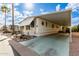 Mobile home with carport and landscaped yard at 9333 E University Dr # 55, Mesa, AZ 85207