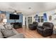 Cozy living room with hardwood floors, fireplace, and comfortable seating at 9333 E University Dr # 55, Mesa, AZ 85207