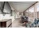 Covered porch with seating, providing shade and outdoor space at 9333 E University Dr # 55, Mesa, AZ 85207