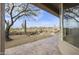 Spacious backyard with desert landscaping, stone patio, and mountain views at 9514 E Cavalry Dr, Scottsdale, AZ 85262
